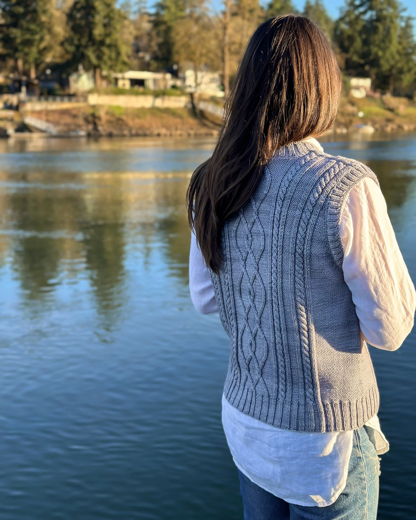 Golden hour sunshine makes the back cables glow on Tryon Creek Vest.