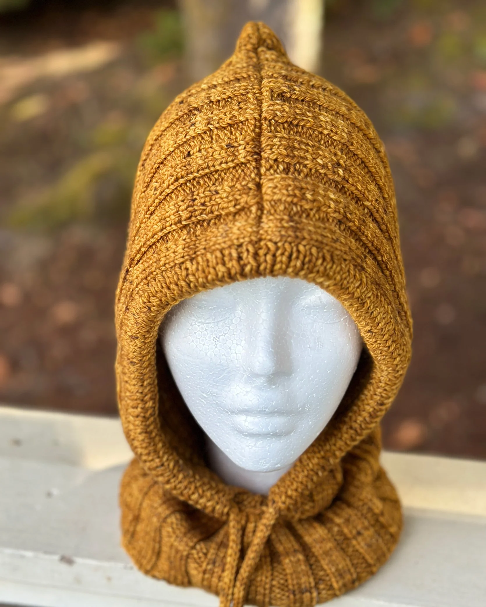Mt Hood is a versatile ribbed hoodie knitting pattern that has an attached cowl.