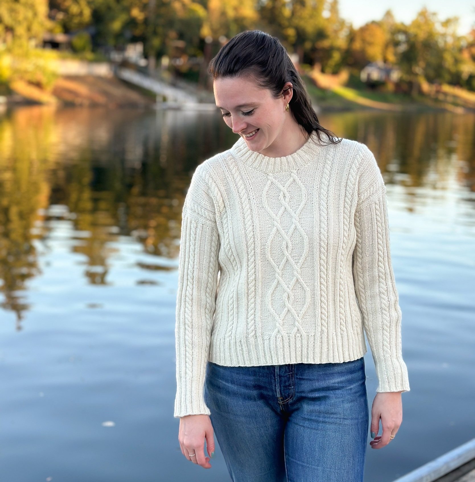 Tryon Creek Knit Sweater - Model wearing cream pullover in Cumbria by The Fibre Co in color White Heather.