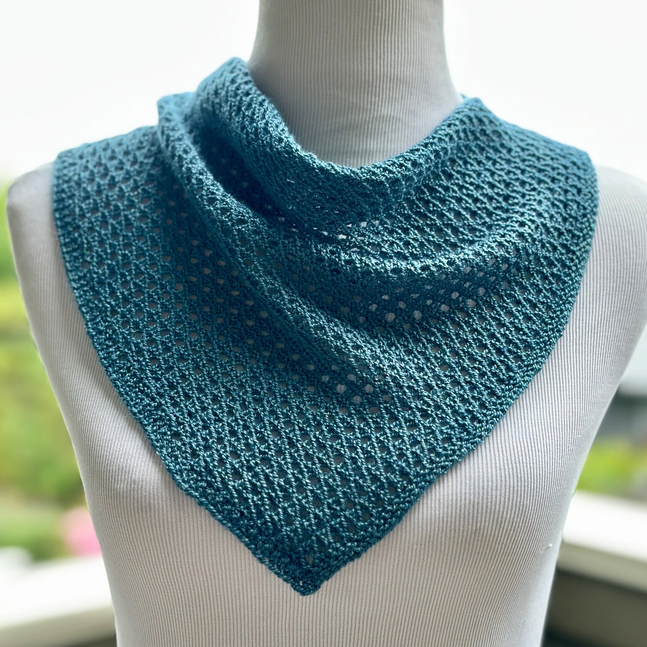 Moonbeam Cowl knitting pattern shown in Madelinetosh Lunar yarn.