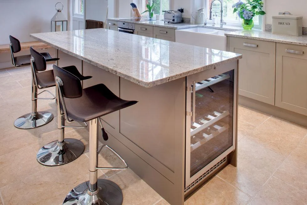 This island with just one row of cabinets has space enough for one cooler CREDITS: TRESKE KITCHEN