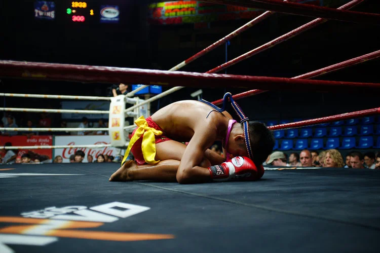  Wai Khru ceremonial dance to seal the ring from malicious spirits.   
