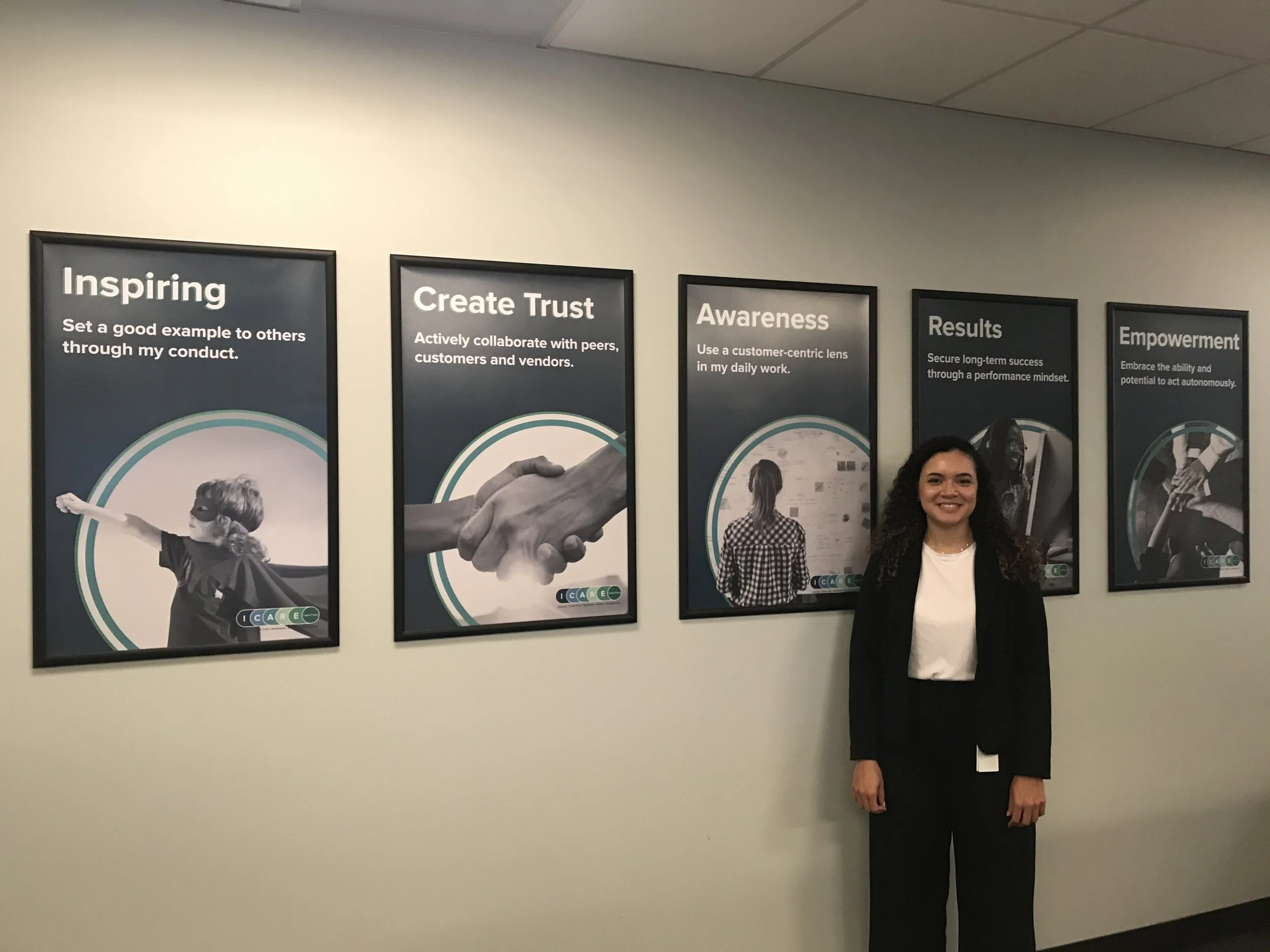 ICARE posters in office break room