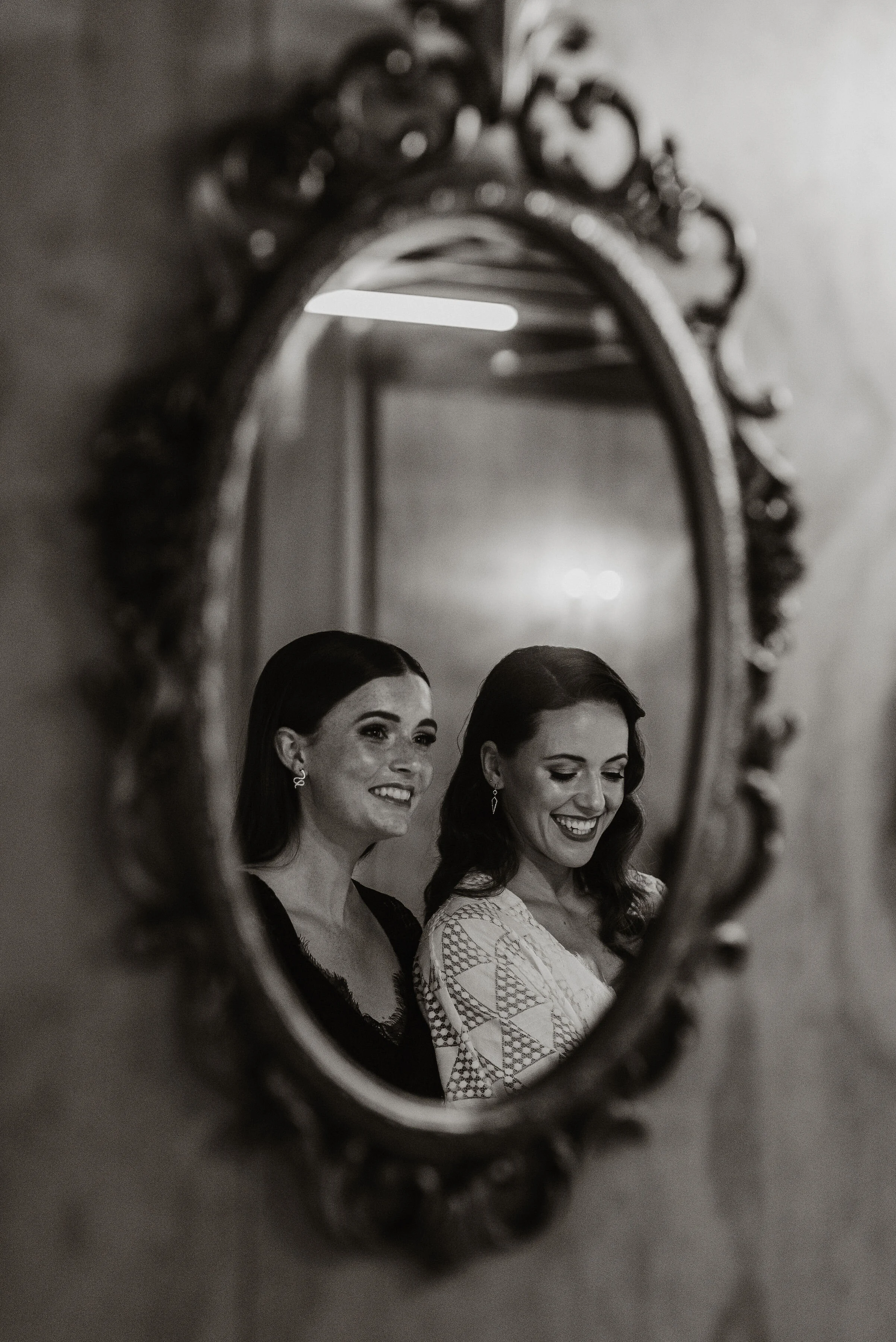 bridal-party-getting-ready-in-lace-robes.jpg