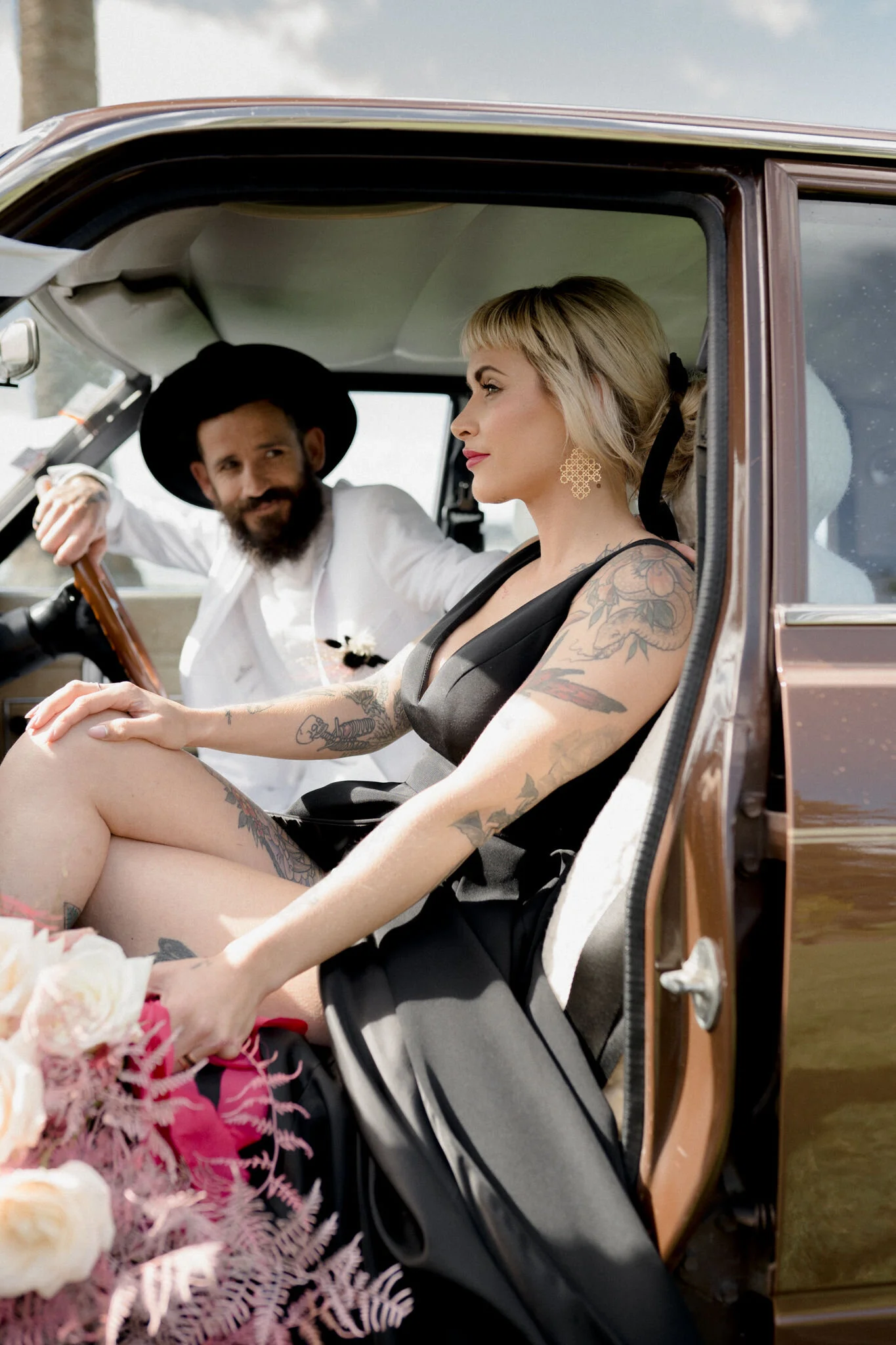 bride-and-groom-in-wedding-car-closeup.jpg