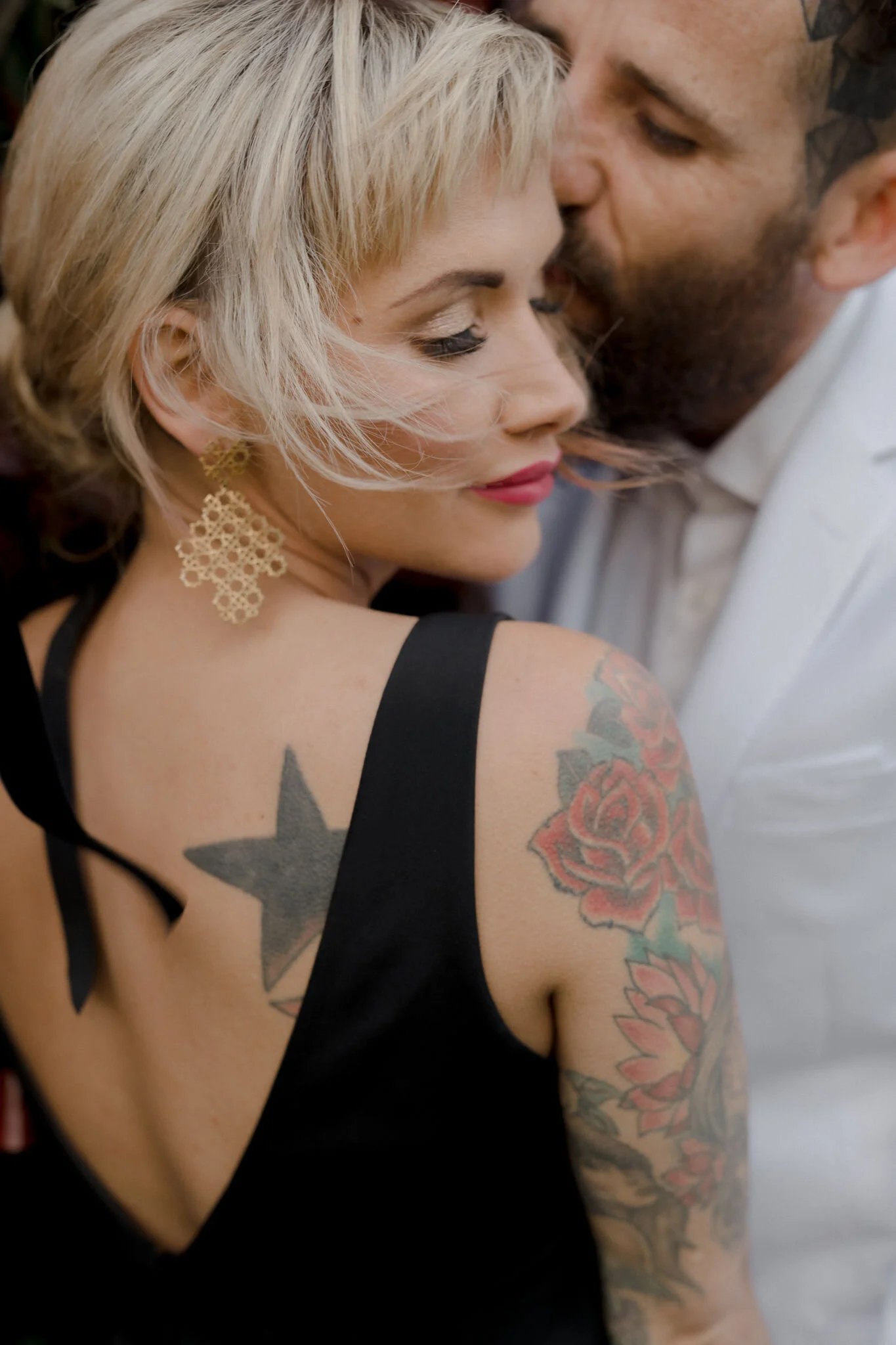 closeup-bride-black-wedding-gown-gold-earrings.jpg