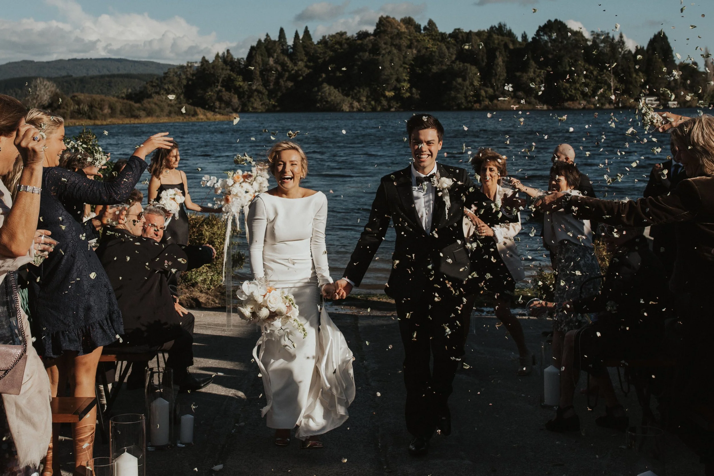 happy-bride-and-groom-confetti-lake-rotoiti.jpg