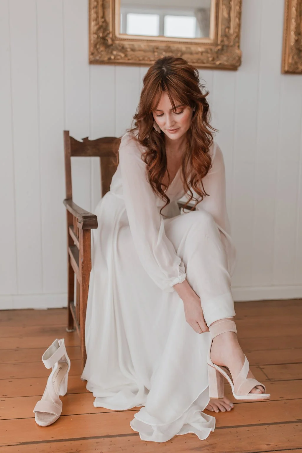 bridal-makeup-artist-tauranga-bride-putting-on-shoes.jpg