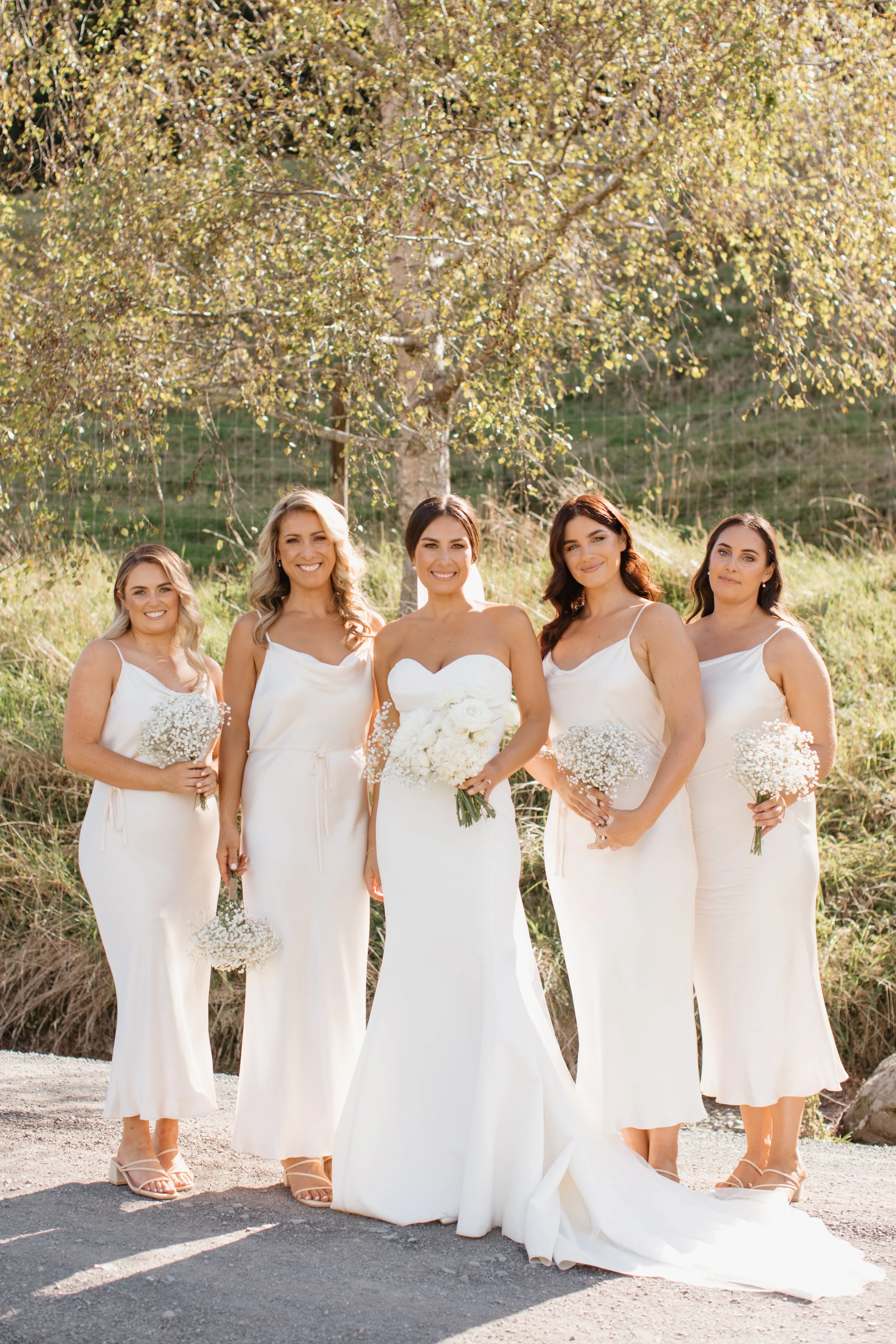 bridesmaids-white-dresses-bridal-party-lake-tarawera.jpg