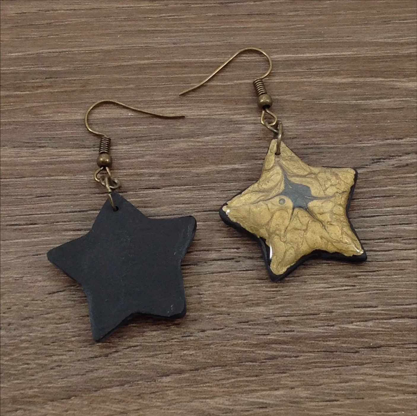 gold colour painted polymer clay star shape drop earring back view