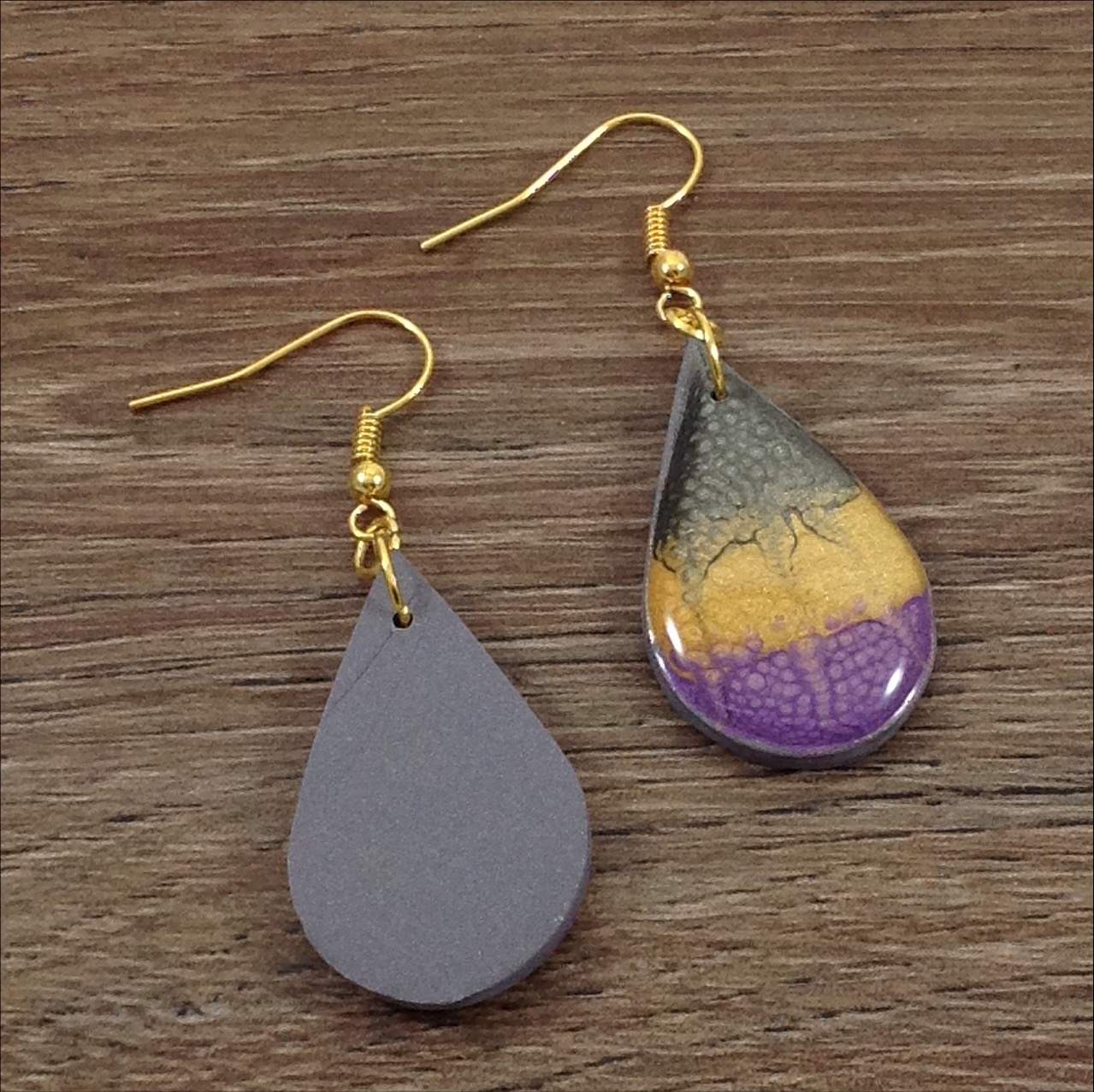 black purple yellow pebeo painted teardrop shape polymer clay earrings back view