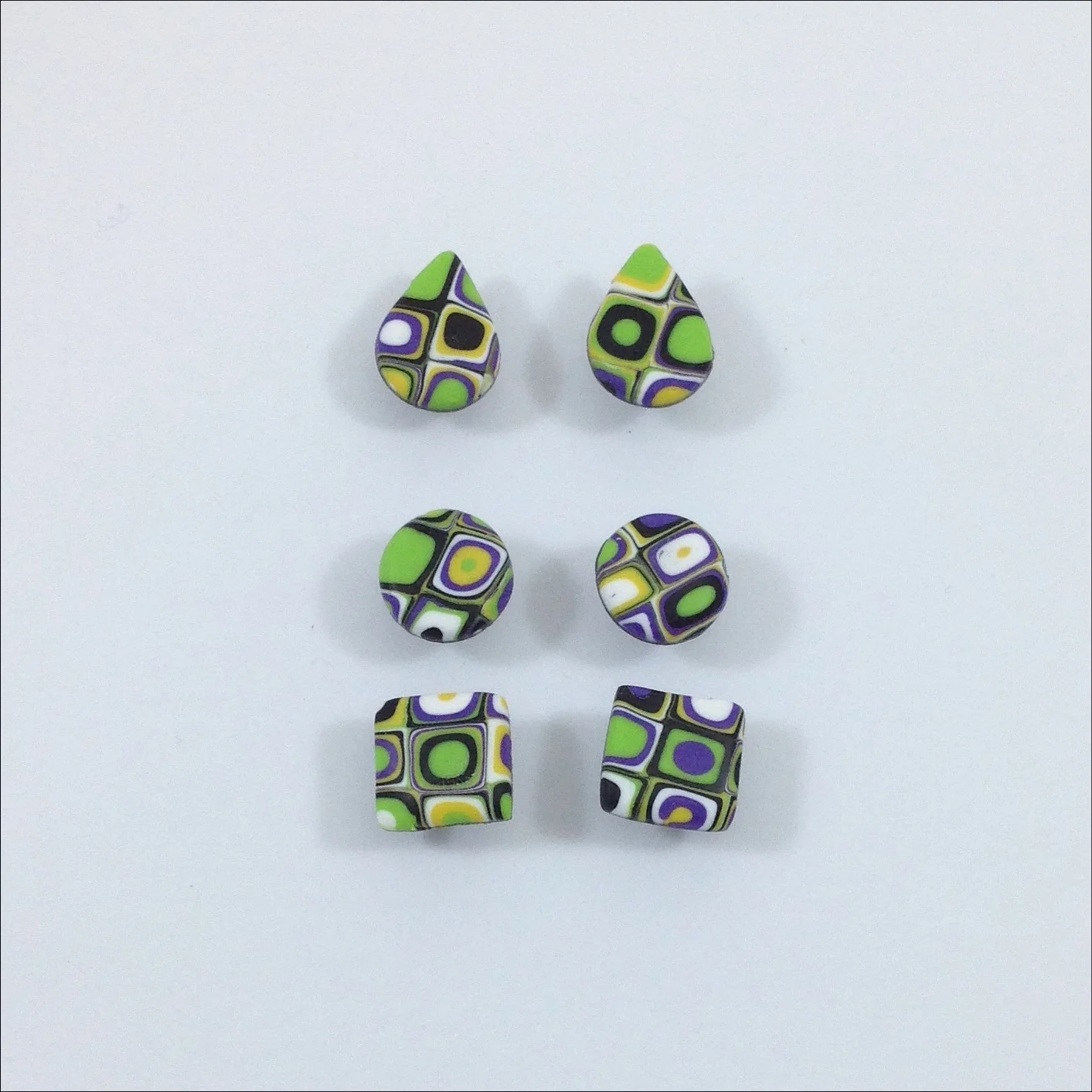 polymer clay stud earrings green purple extruder cane