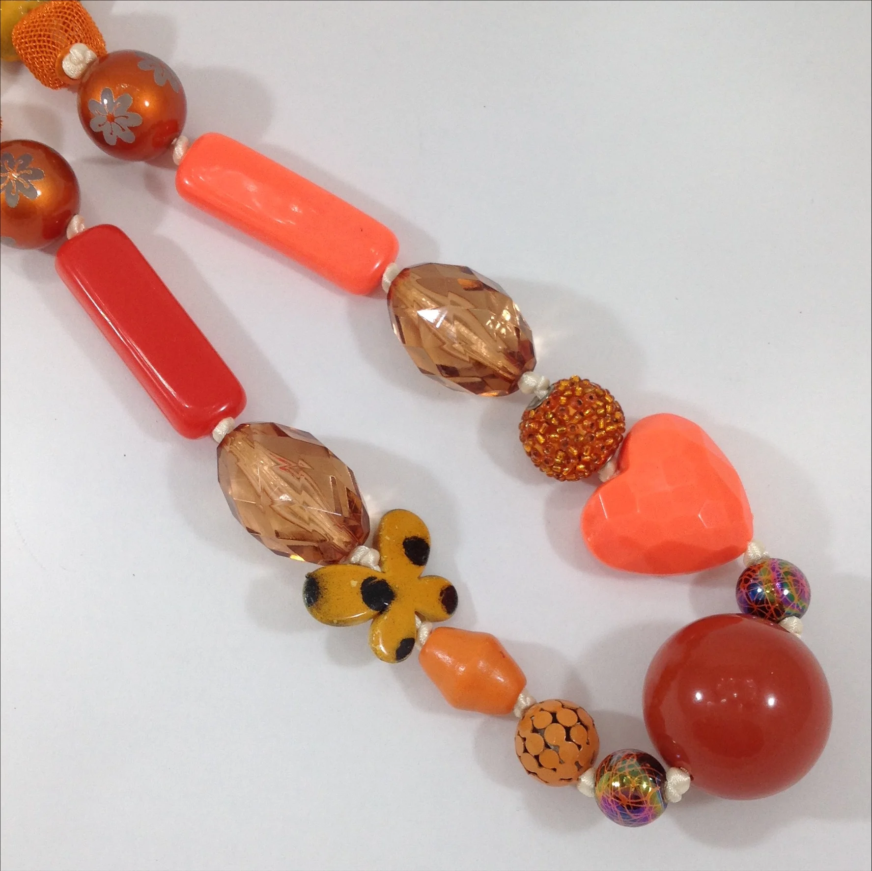 orange mixed bead hand knotted long necklace detail