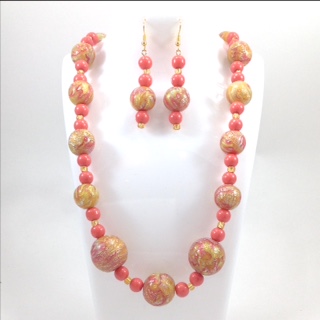pink yellow mokume gane polymer clay bead necklace and earrings on stand