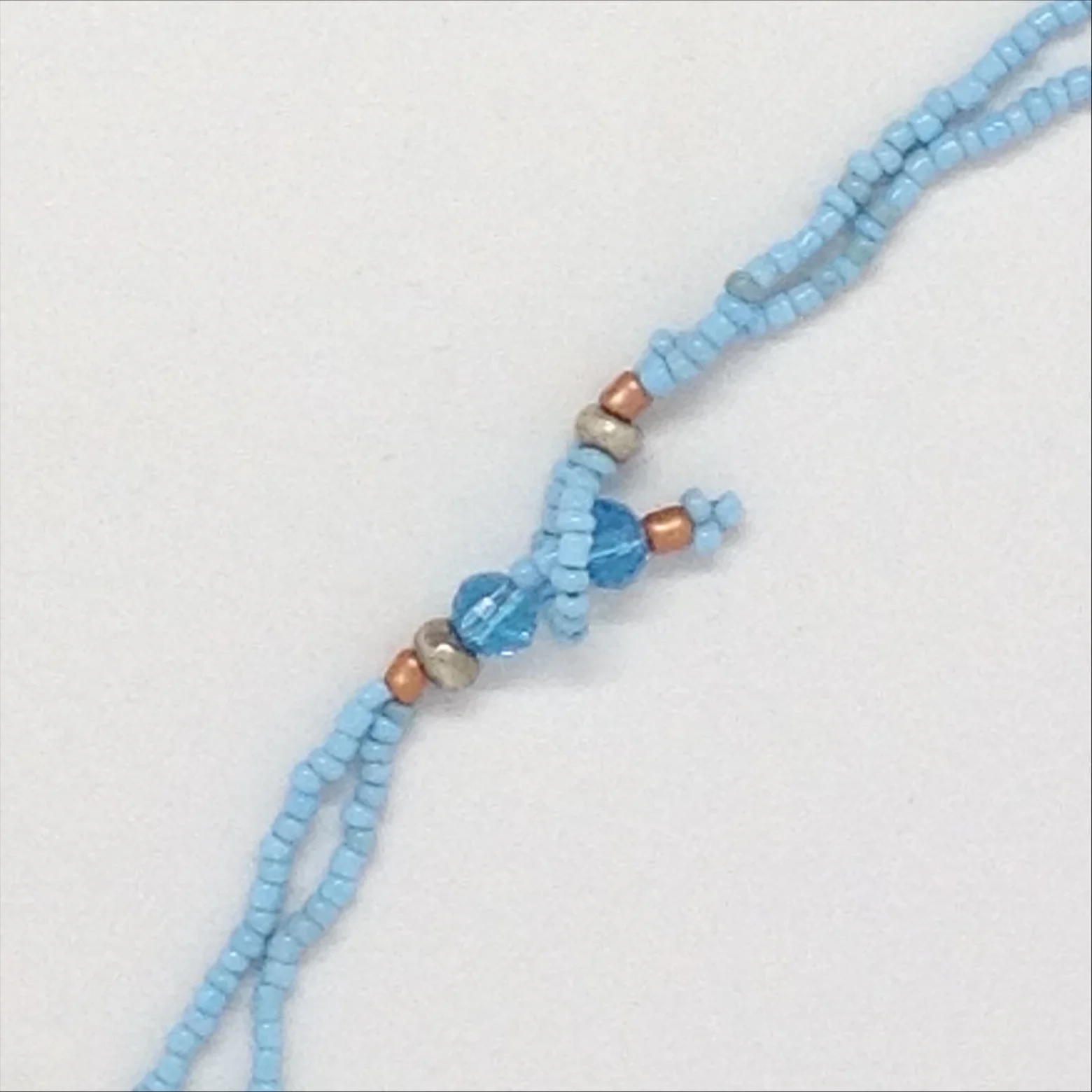 Bead loop necklace fastening detail