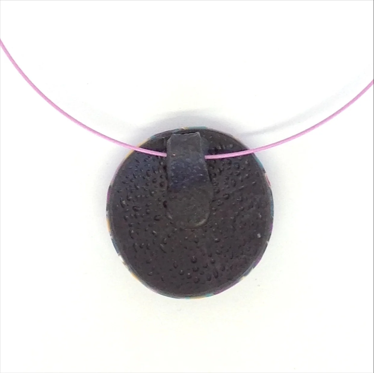 polymer clay domed pendant on wire back detail