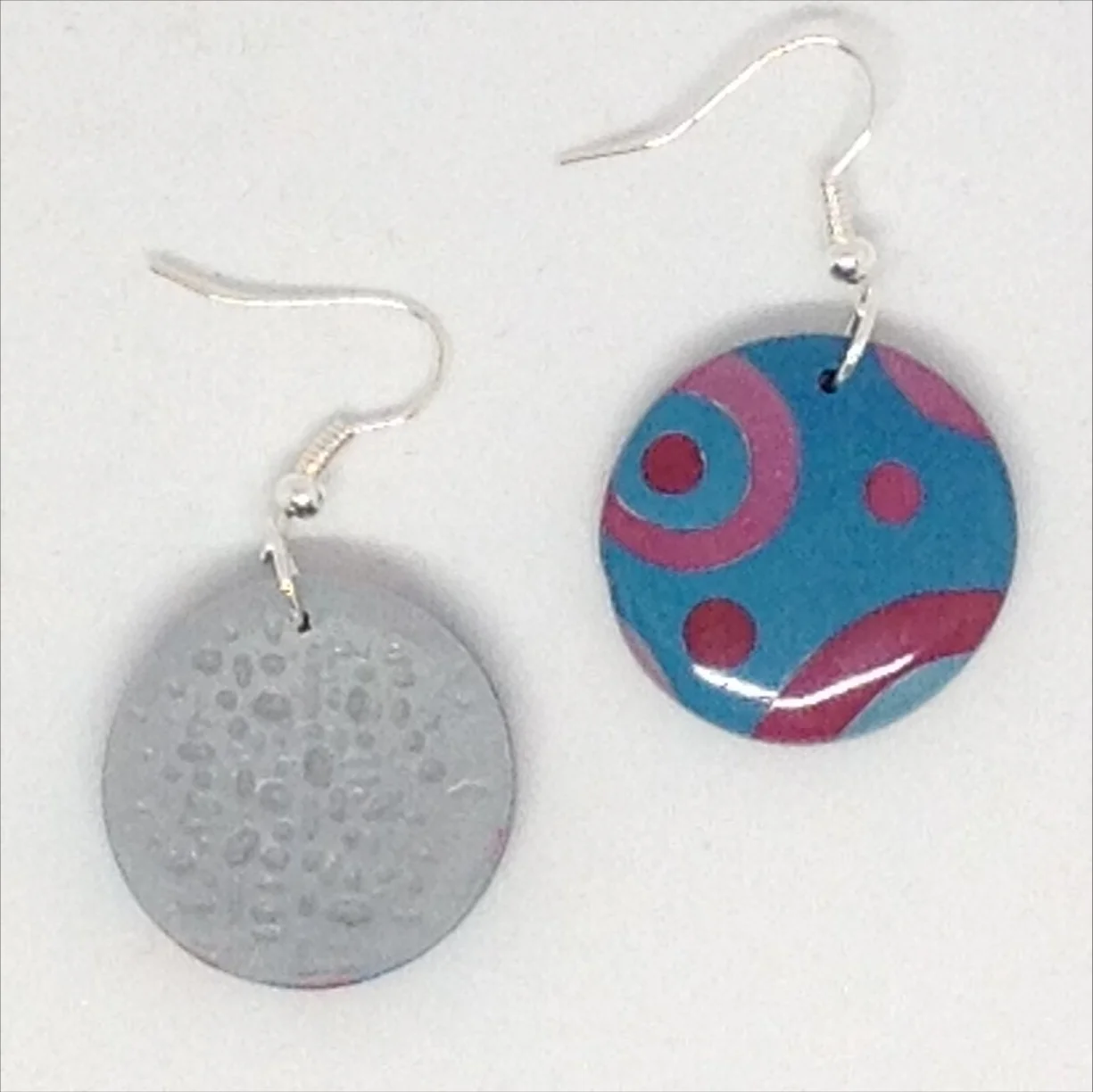 Turquoise and burgundy pattern round polymer clay earrings back detail