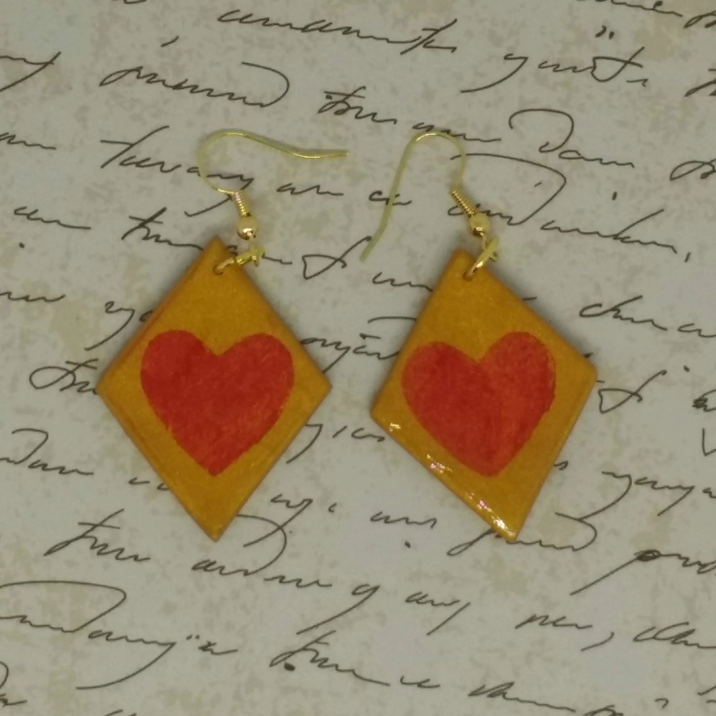 Polymer clay earrings diamond shape gold colour with red heart design