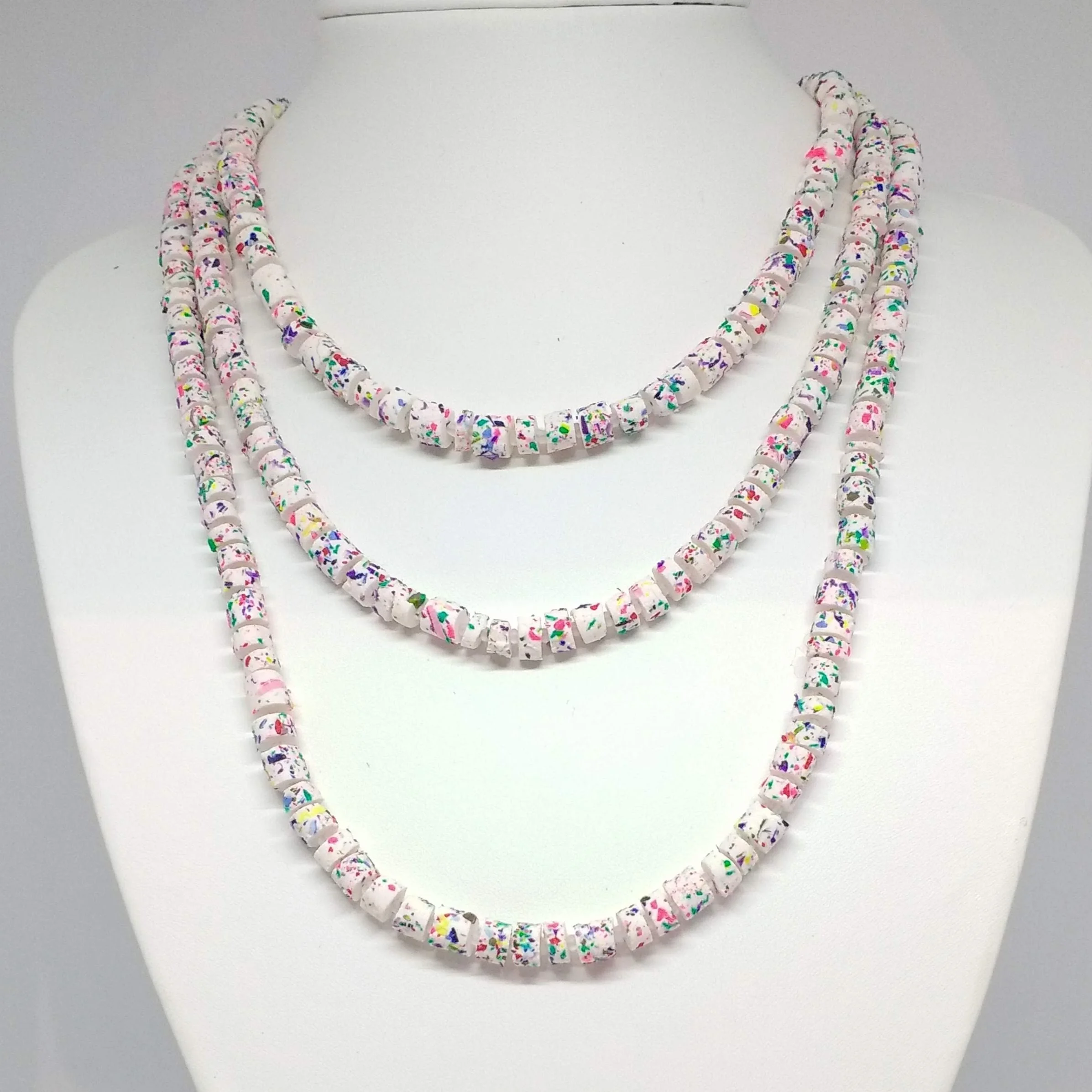 White terrazzo design polymer clay long necklace on model