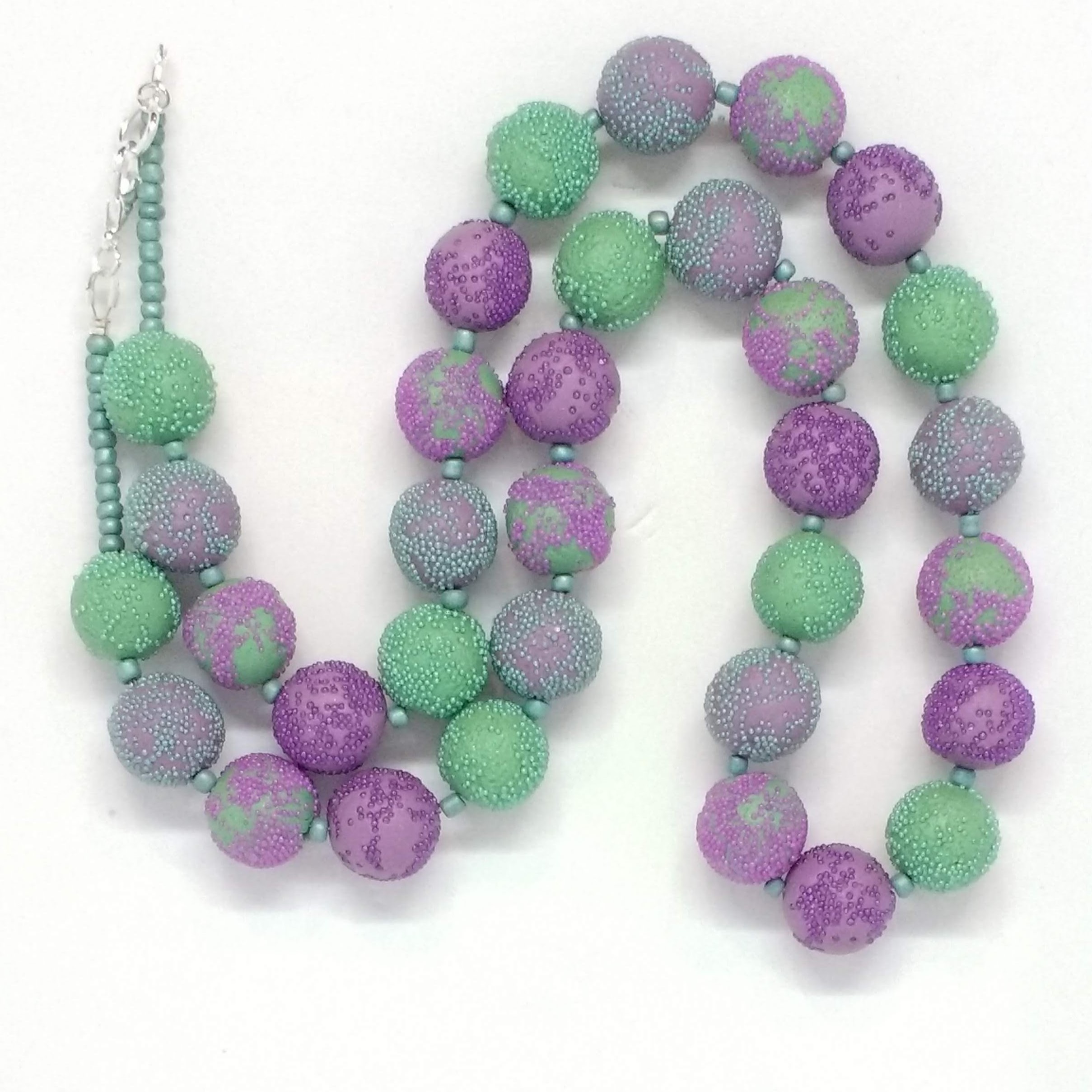 Green and purple polymer clay bead necklace