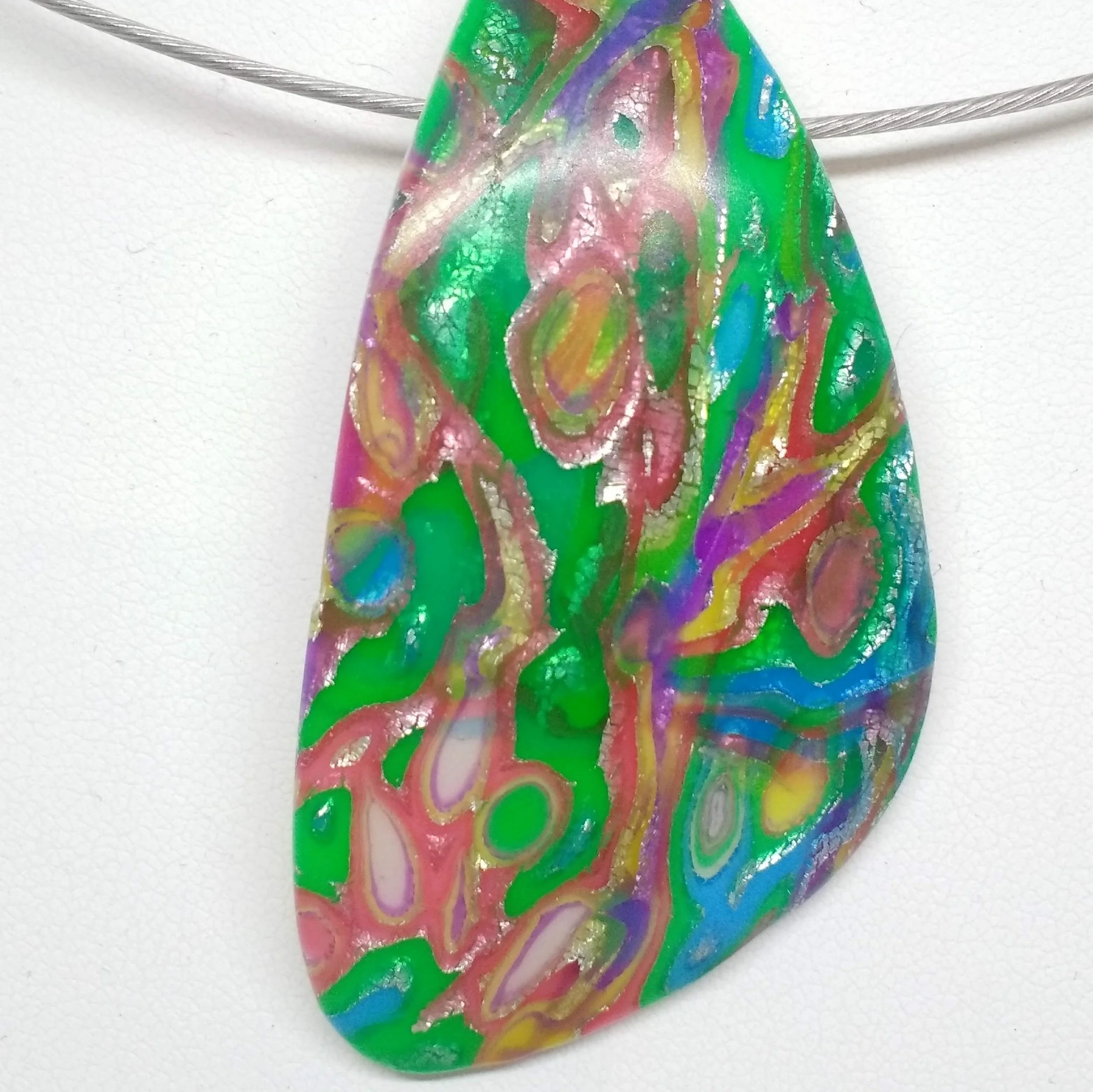 Polymer clay multi colour triangle pendant detail
