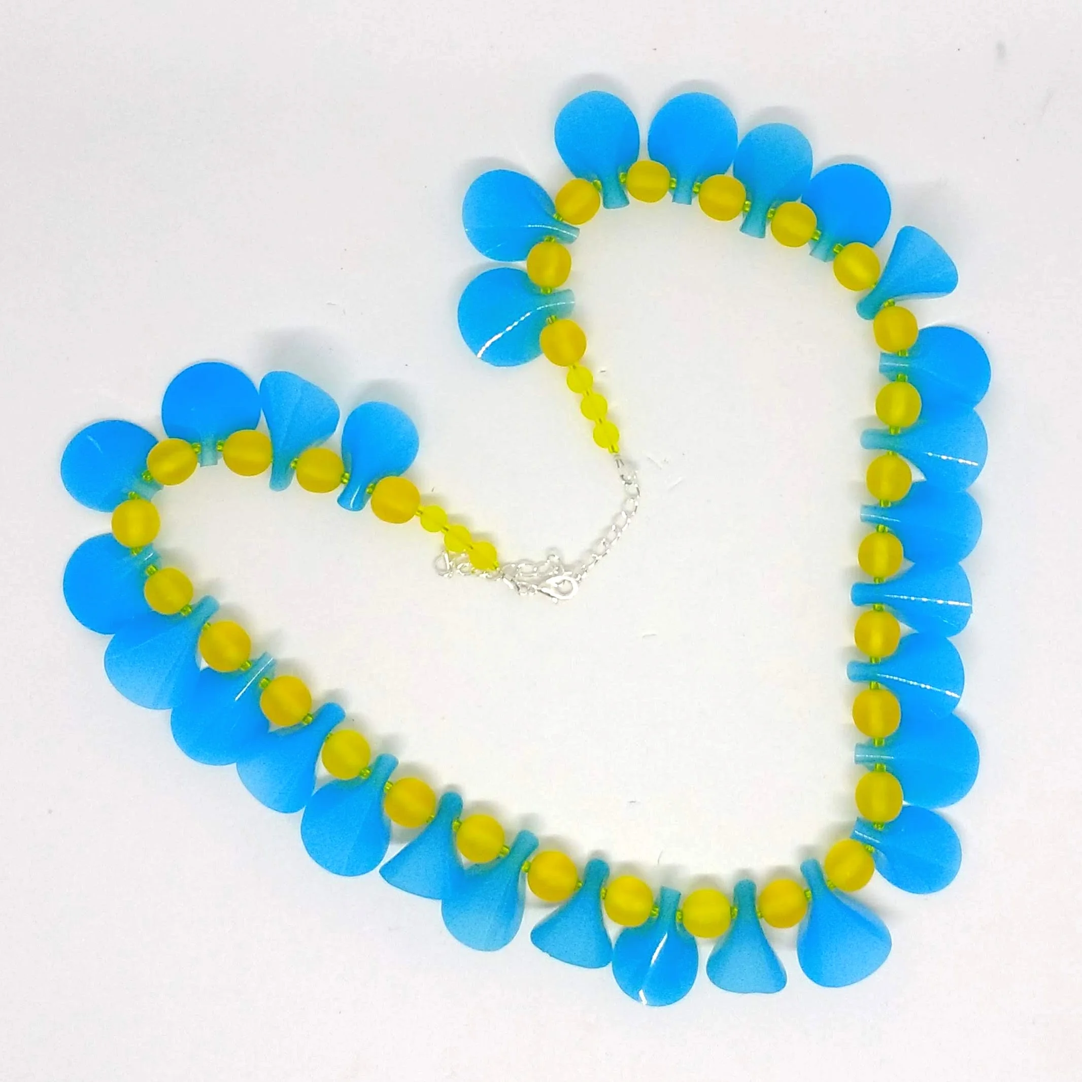 Polymer clay blue petal shapes necklace with yellow beads