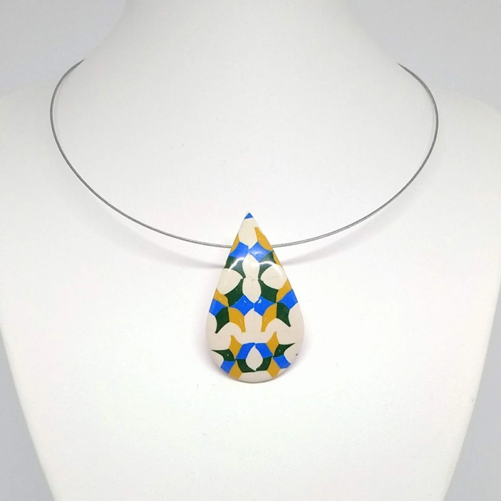 Polymer clay teardrop shape pendant white, blue, green yellow pattern