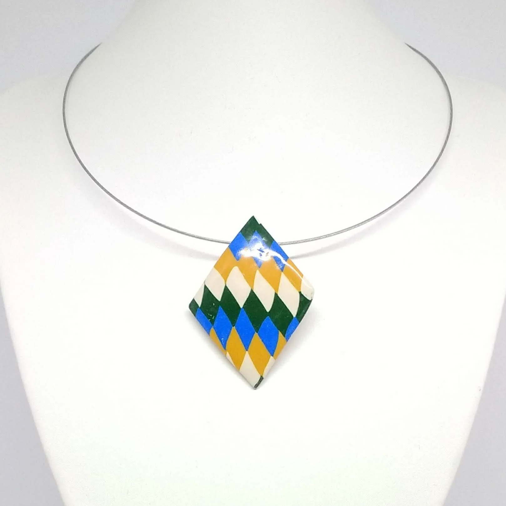 Polymer clay diamond shape pendant white, blue, green yellow pattern