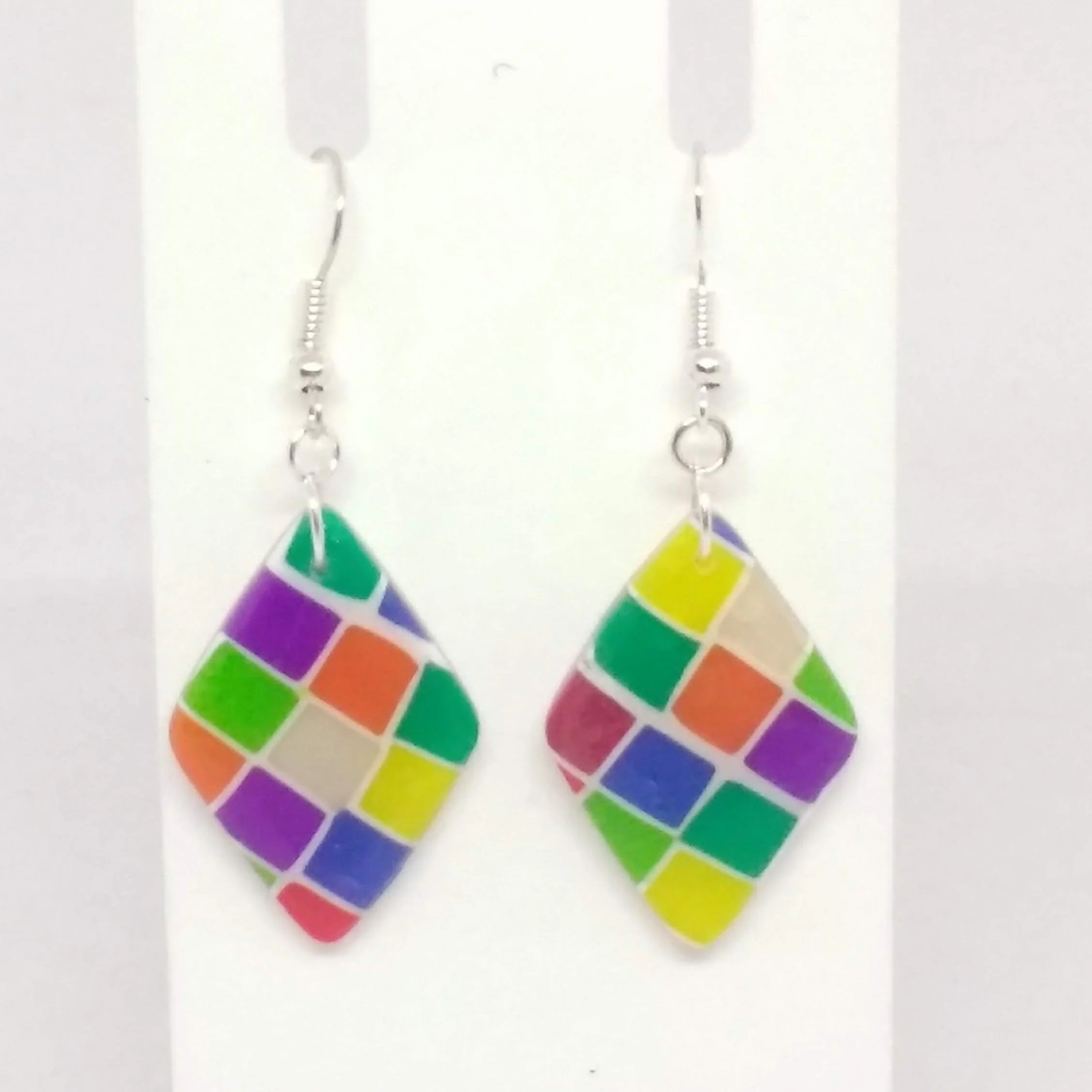 Polymer clay earrings with multicoloured square pattern diamond shape