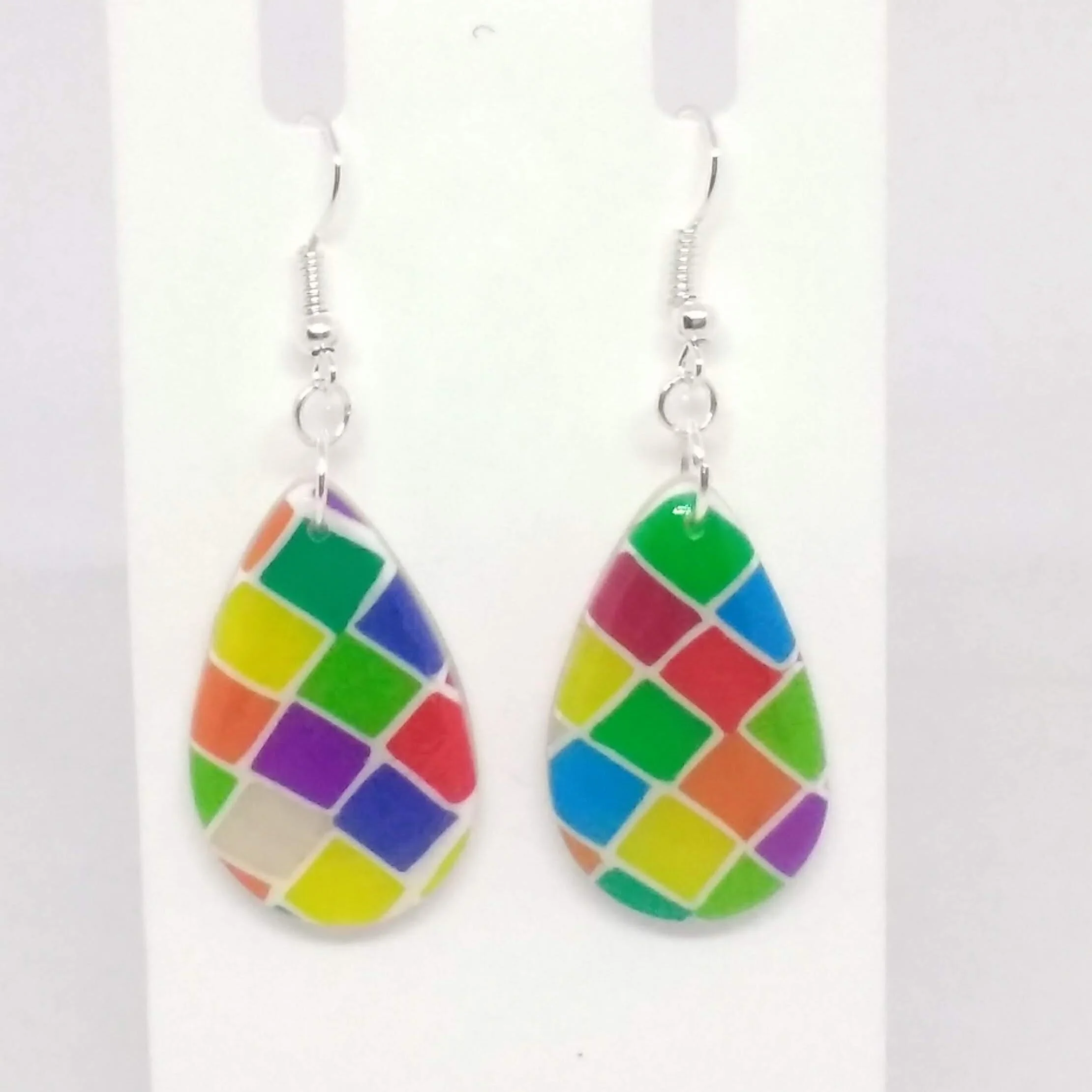 Polymer clay earrings with multicoloured square pattern teardrop shape