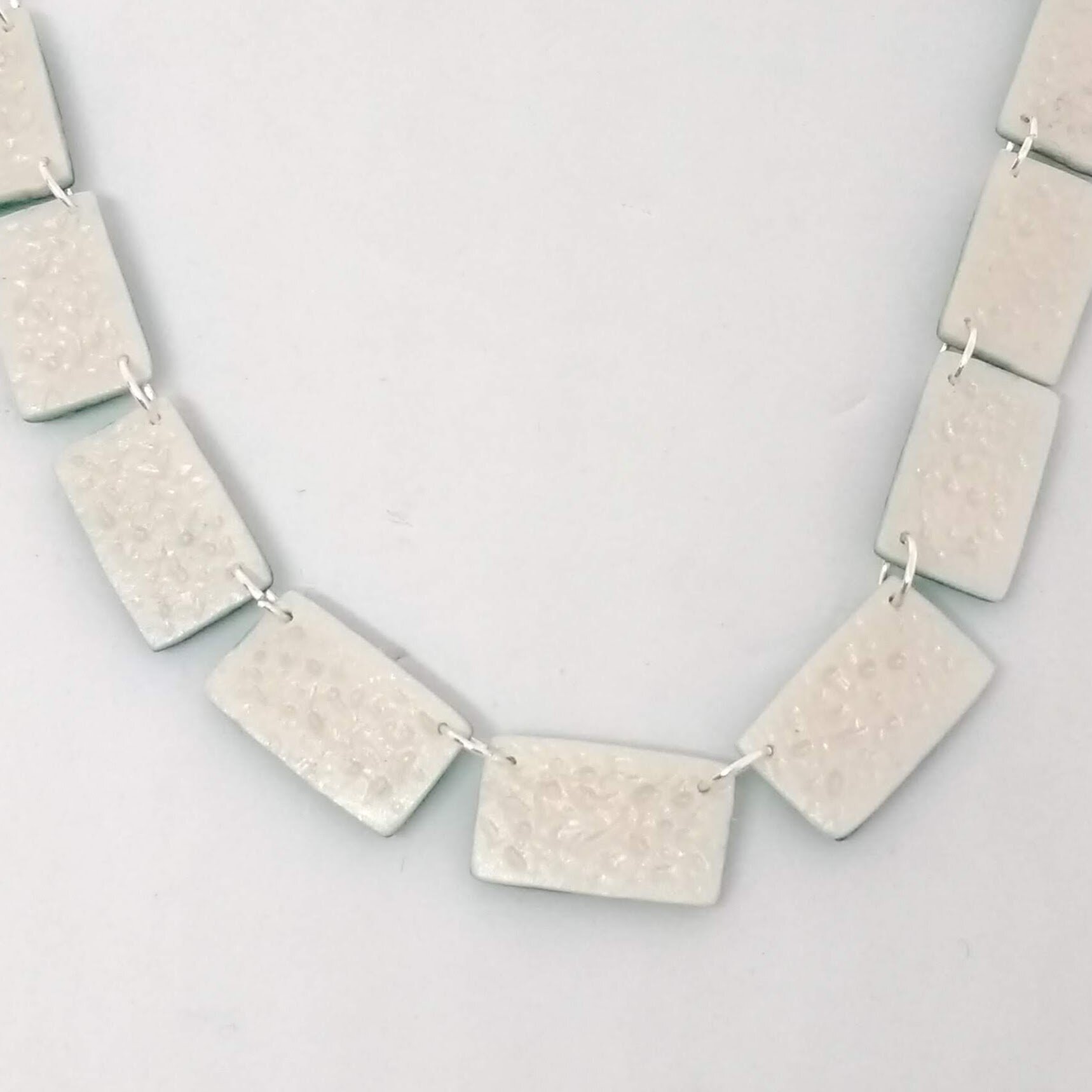 Back detail of polymer clay oblong bead necklace