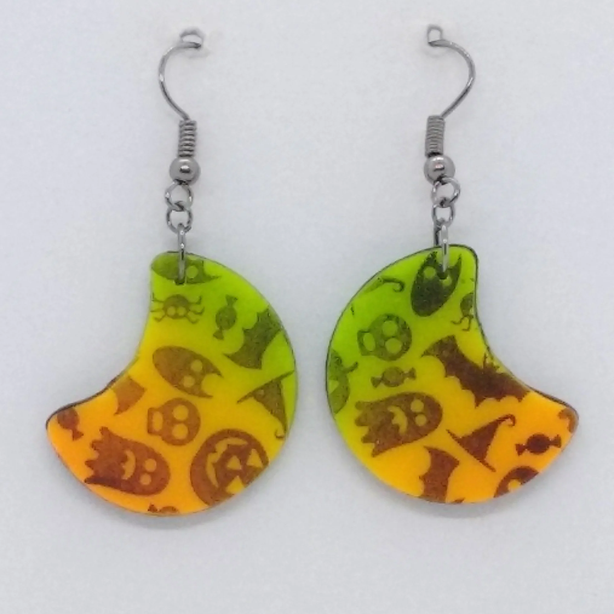 orange and green colour crescent shape halloween design earrings