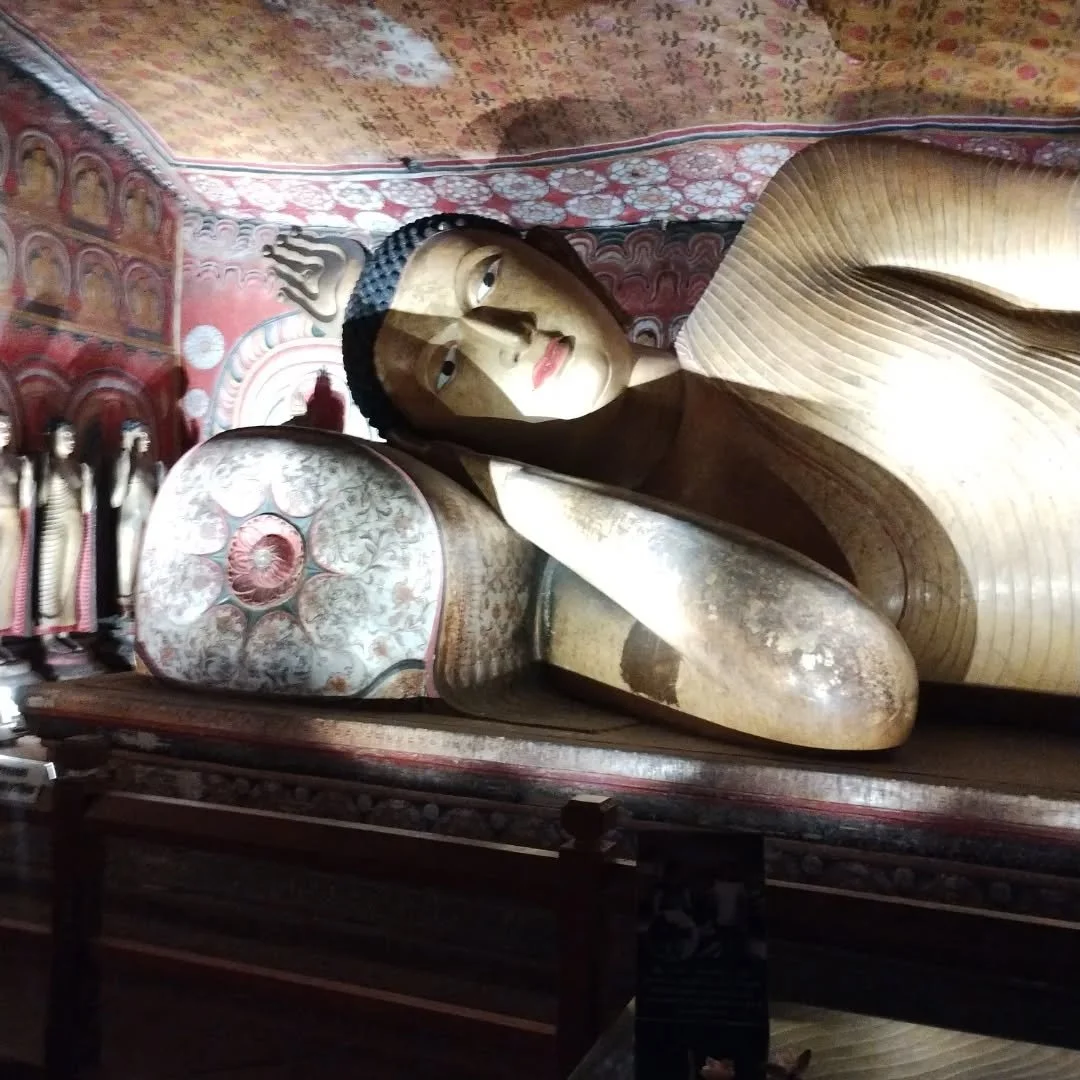 This is one of many Buddhas at Dambulla Cave Temple.  It has been a sacred pilgrimage site for 22 centuries and is now a world heritage site.

The 5 main caves contain wall murals covering 2,200 sq metres and 153 Buddha statues.  One cave has over 1,