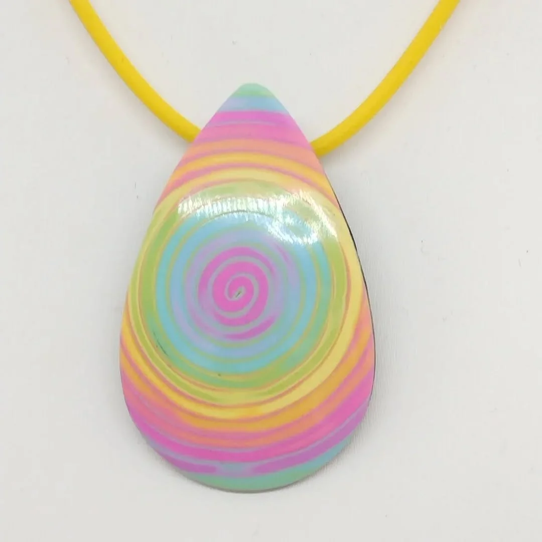 After all the coiling and recoiling here are a couple of finished items, a pendant and earrings with a rainbow type design.

#rainbowdesign #polymerclaydesigns #colourfuljewellery #handmadejewellery #polymerclayjewellery