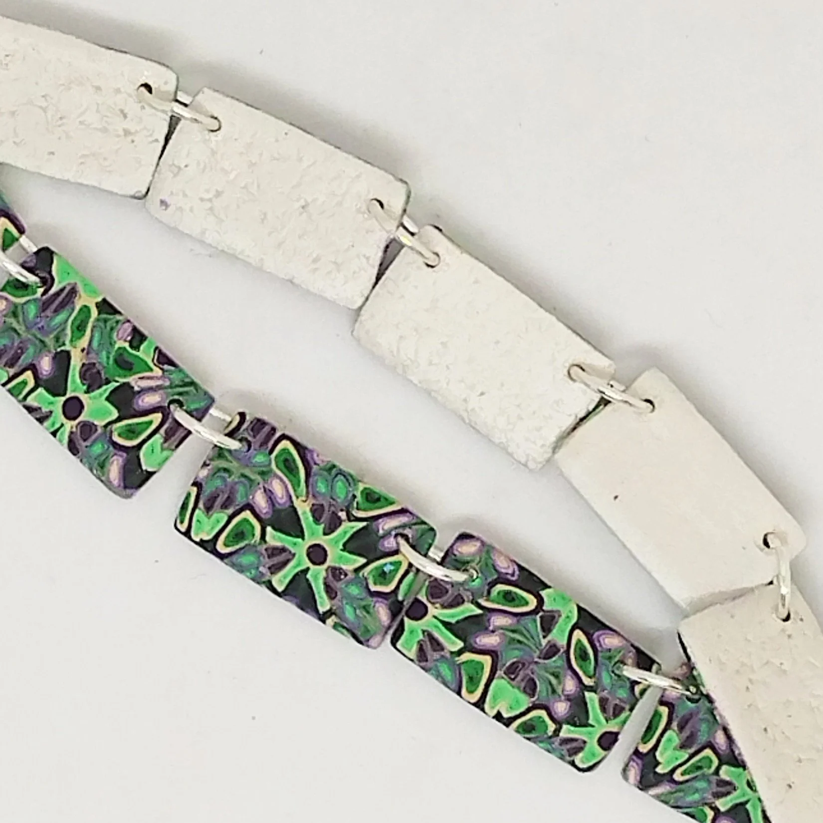 Green kaleidoscope rectangle bead necklace close up