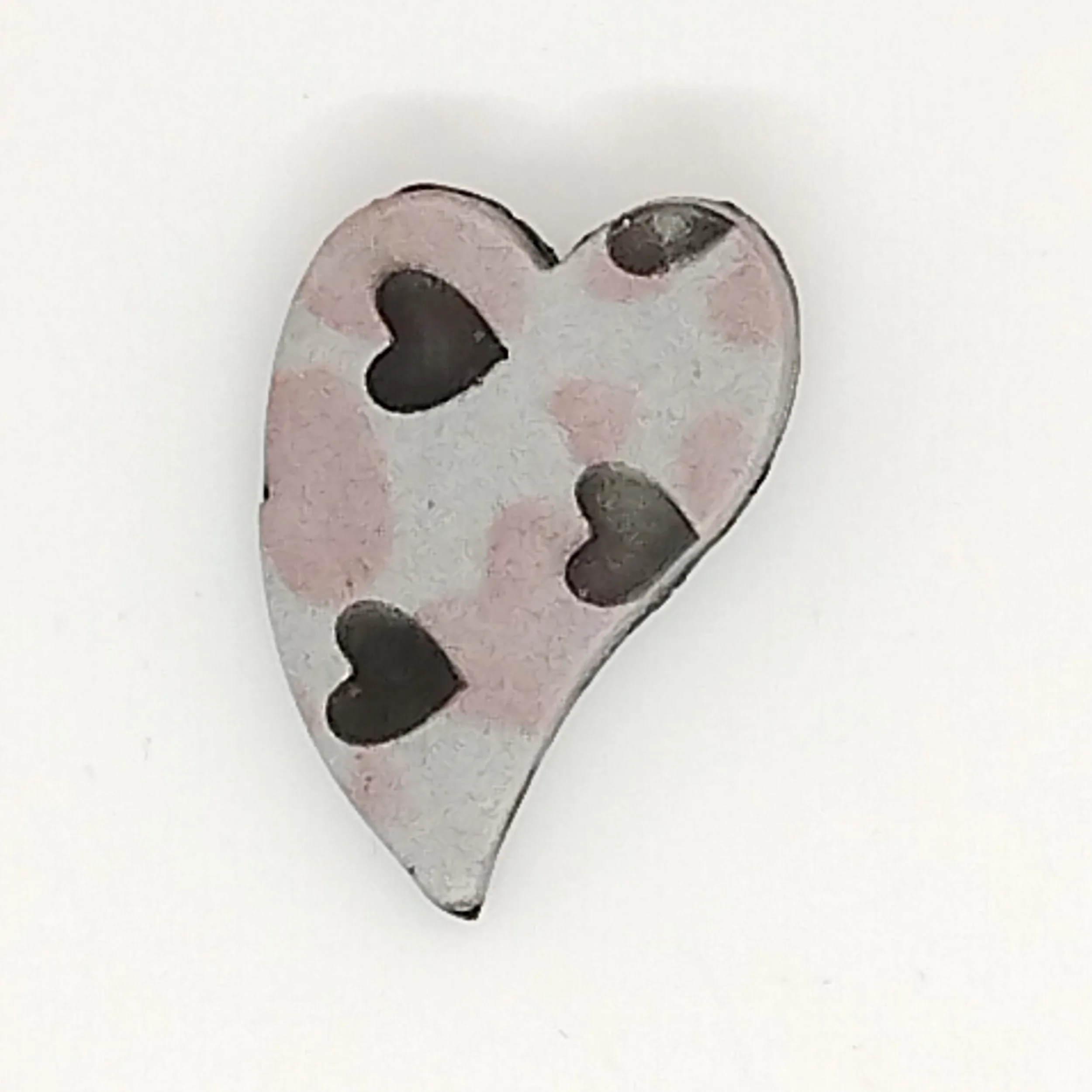 Grey heart shape brooch with black and pink heart decoration