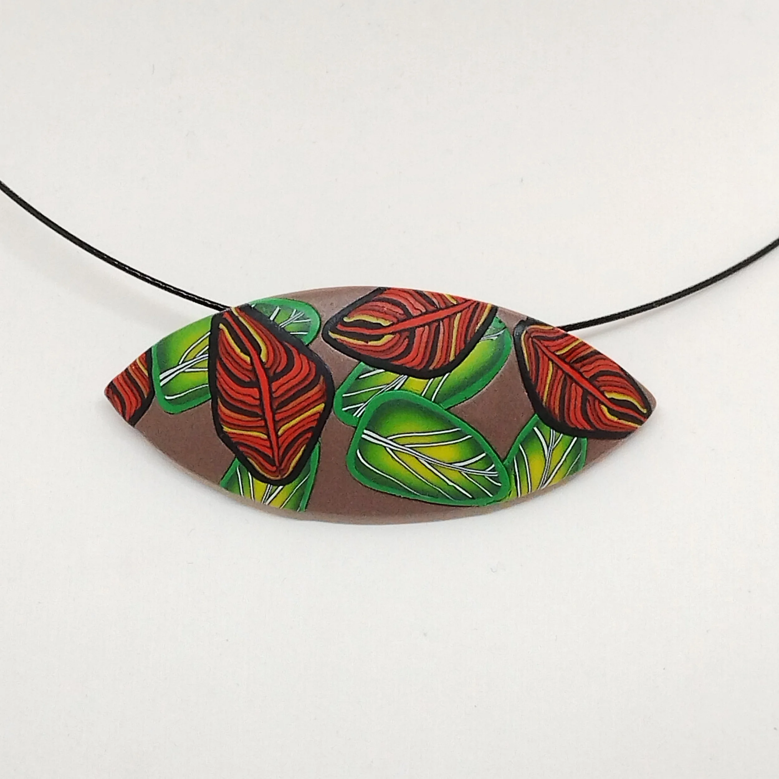 Oval shape polymer clay leaf pattern pendant