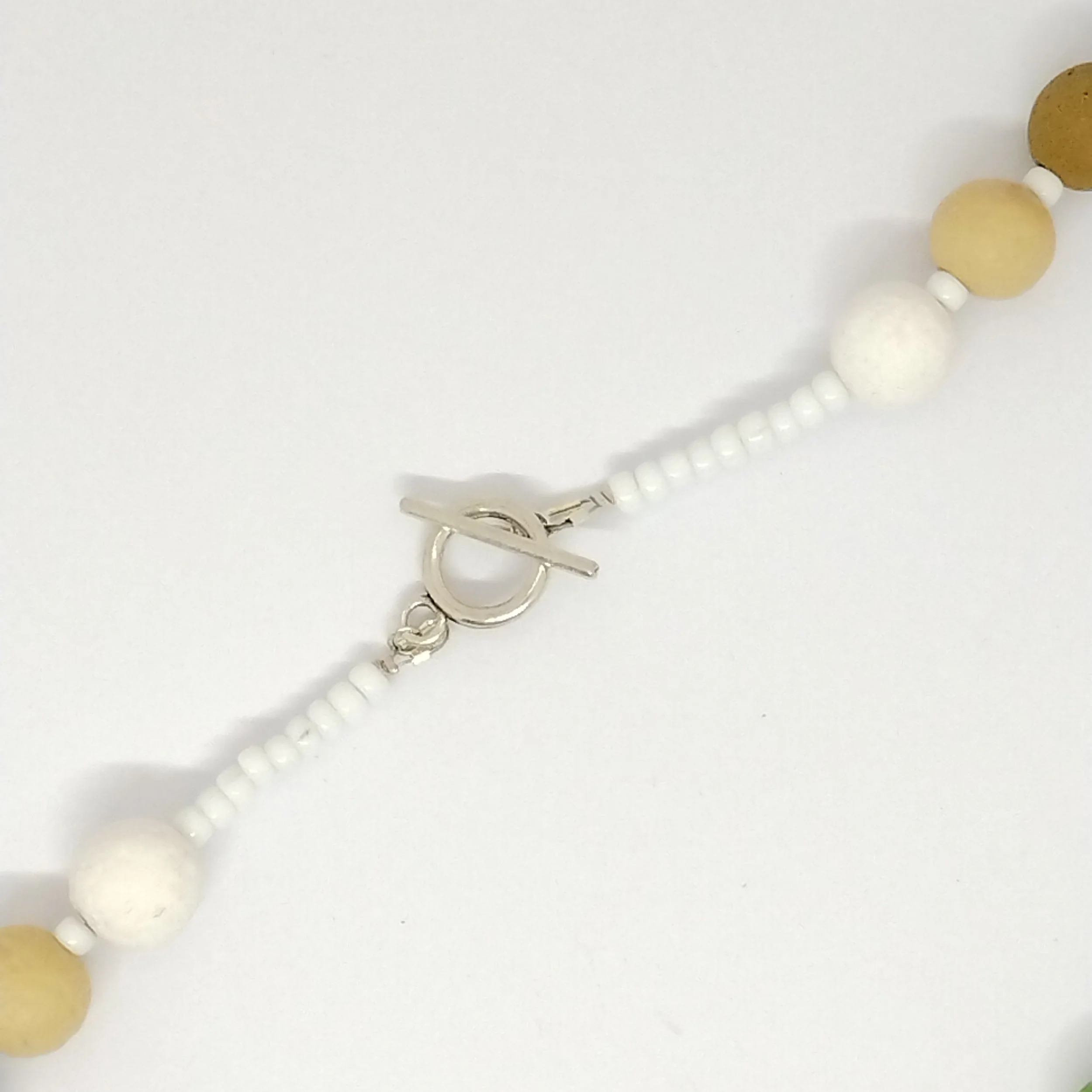 fastening detail for multicoloured polymer clay bead necklace
