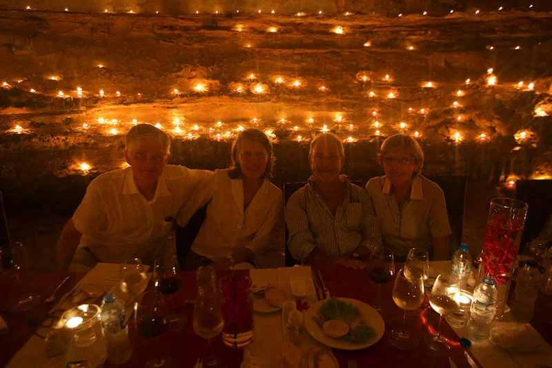 Verena, Amnon (right), Barbara and Max soak in the ambiance of 1200 candles as they dine in a cave.