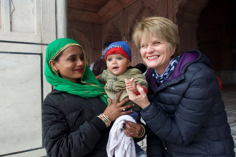 Wendy with locals in the Red Forte, India.