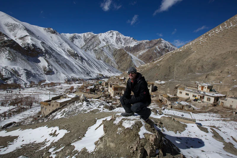Ian perched over the town of Rumbak after a successful quest in search for Snow Leopards.