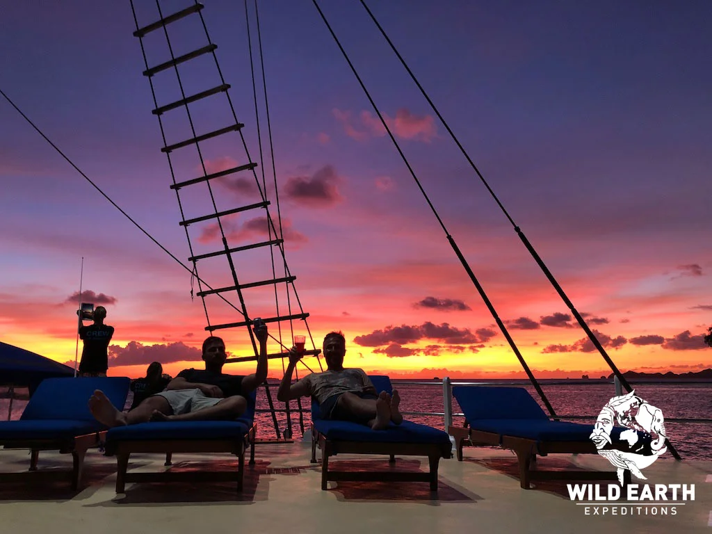 'chilling' on the deck at sunset - Palau - Wild Earth Expeditions