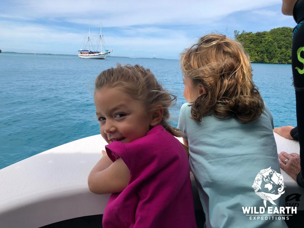 Coco and Estelle enjoy a boat ride through the Rock Islands - Palau - Wild Earth Expeditions