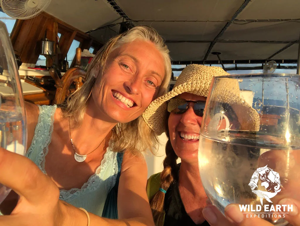 Natalia & Robin enjoy a 'sundowner' - Palau - Wild Earth Expeditions