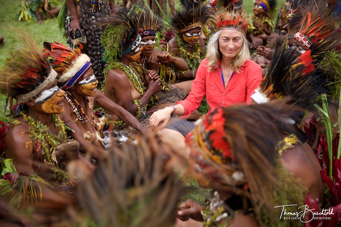 Natalia sits with the locals, Goroka - Papua New Guinea - Wild Earth Expeditions