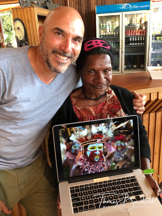 Thomas reunites with one of the tribal dancers from Goroka in Mount Hagen - Papua New Guinea - Wild Earth Expeditions