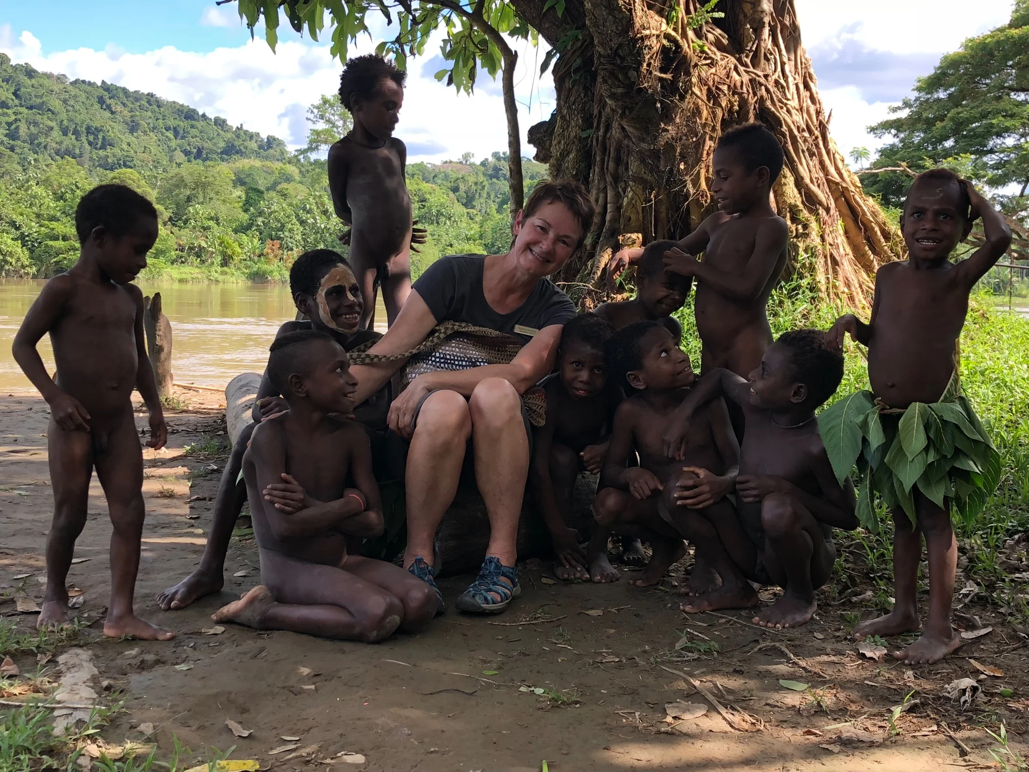 Suzanne with the children of the Sepik - Papua New Guinea - Wild Earth Expeditions