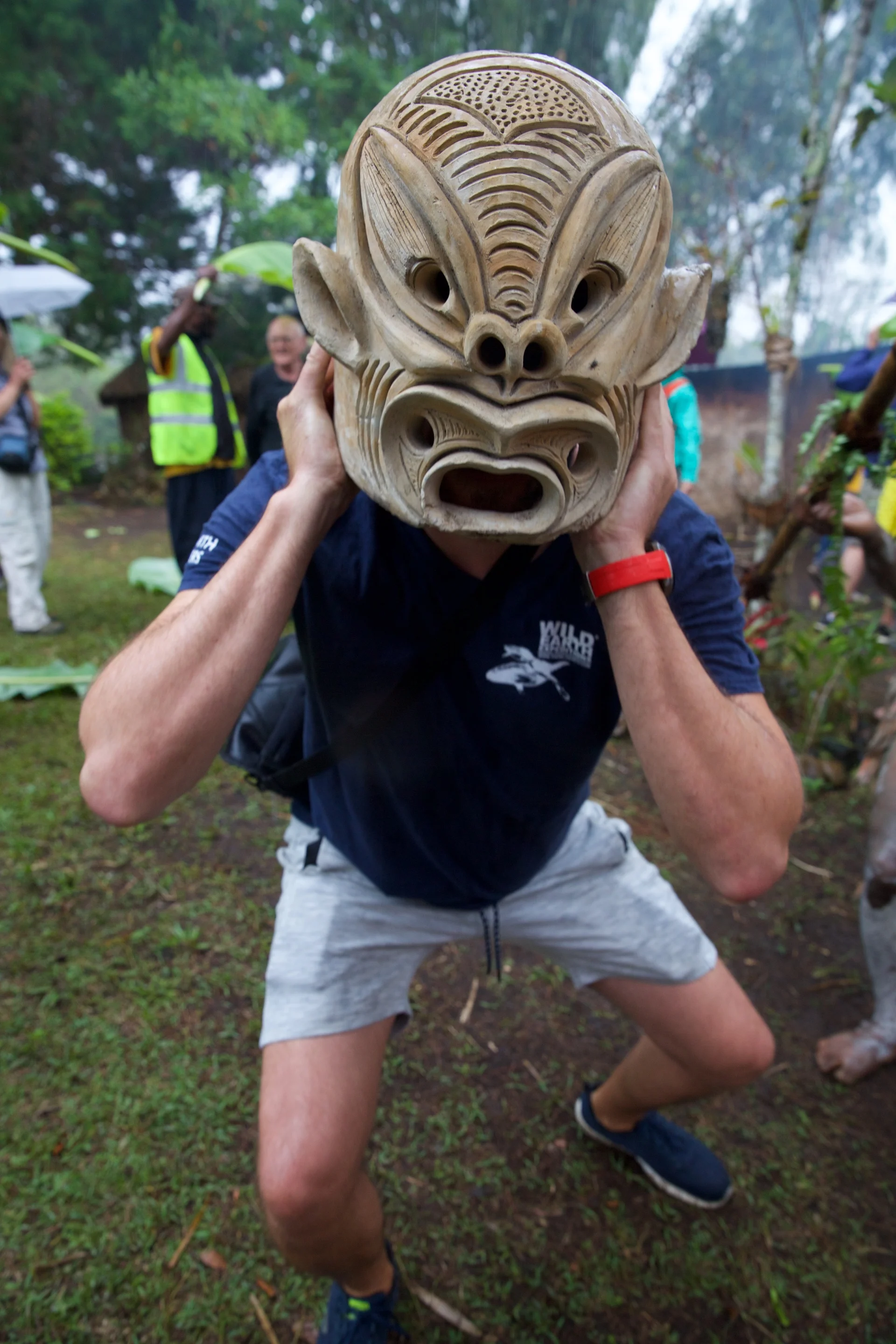 Andreas gets into the spirit with an Asaro Mudmen mask - Papua New Guinea - Wild Earth Expeditions