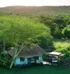 South-Africa-Phinda-Zuka-Lodge-suite-exterior-view-with-couple-High-Resolution-Width=5000px.jpg