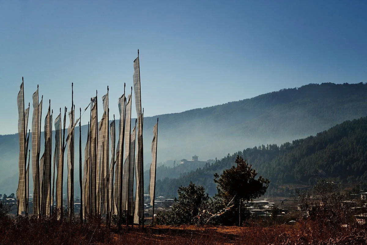 28HIMA_Bhutan © Windows of Bhutan_Bumthang-Bhutan-Prayerflag_.Jakar_Dzong_1200.jpg